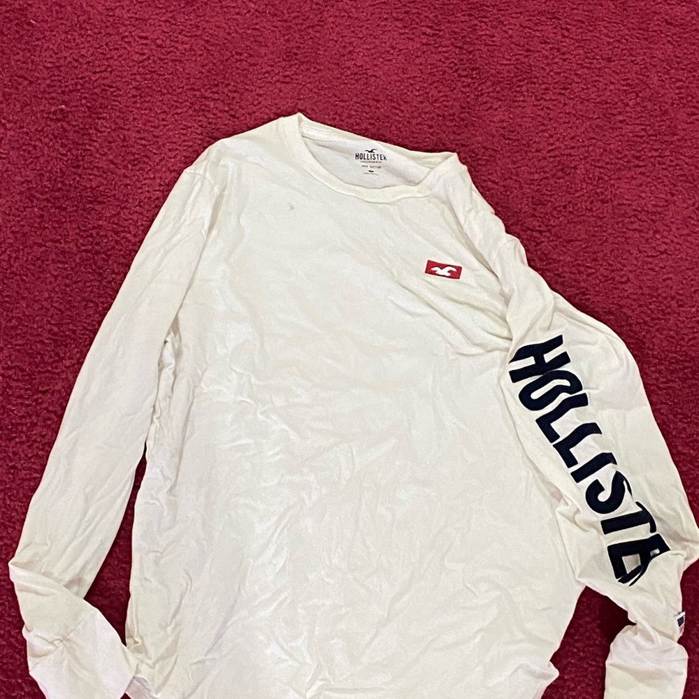 Hollister White Long Sleeve Tee with Navy Sleeve Logo and Red Chest Patch